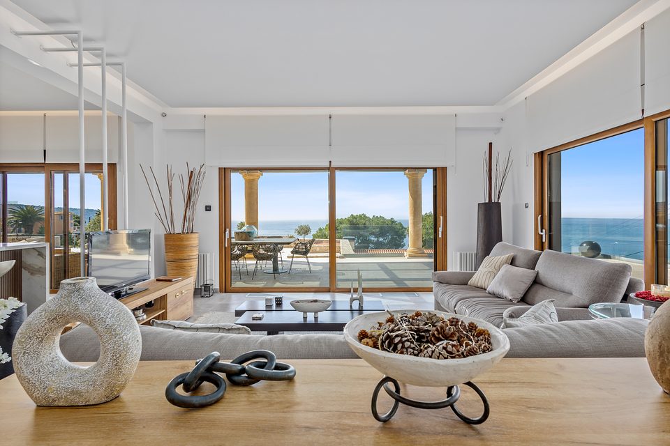 The View House open-plan living, kitchen, and dining flowing to the sea-view terrace