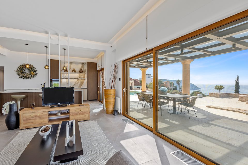 The View House wide living room interior facing the dining space