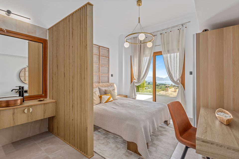 A ground-floor View House suite with backlit headboard niches and integrated storage