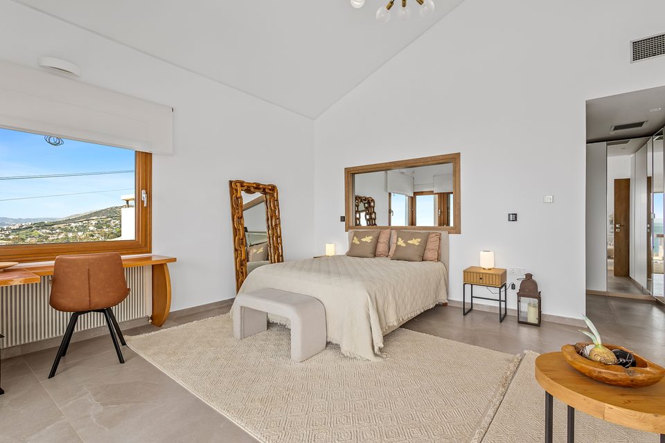 A top-floor View House main bedroom with sea views